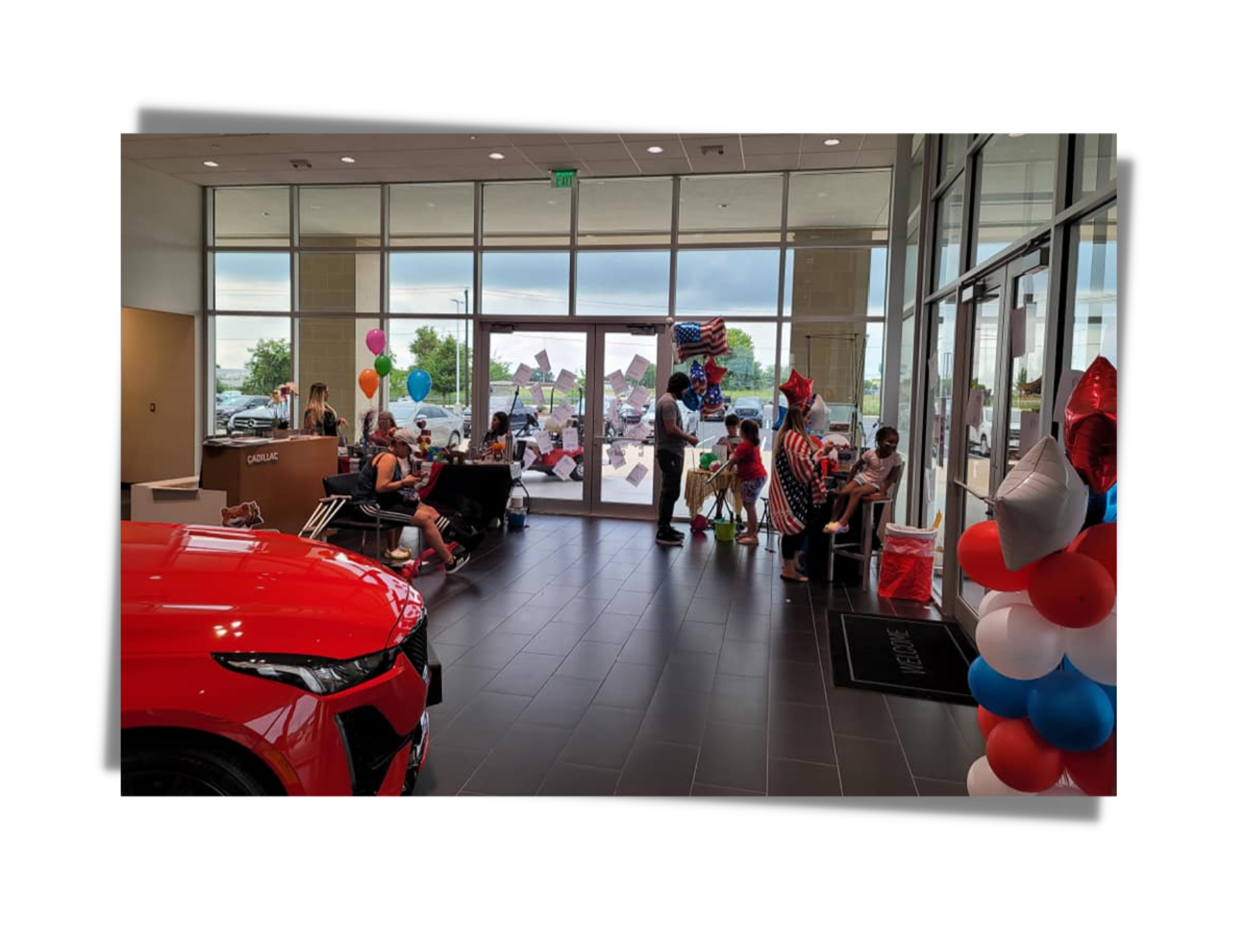 dealership showroom decorated with patriotic balloons during family-friendly Freedom & Fireworks event