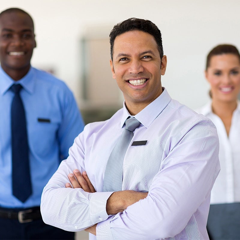 Friendly salesperson smiling in a warm welcome